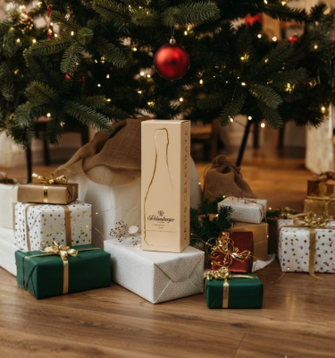 Schlumberger Geschenkkarton unter Baum